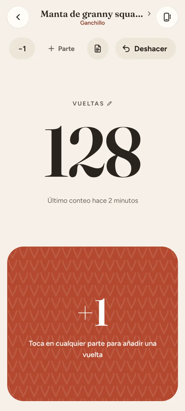 El contador de un proyecto de ganchillo en 128 vueltas, con un gran botón +1.