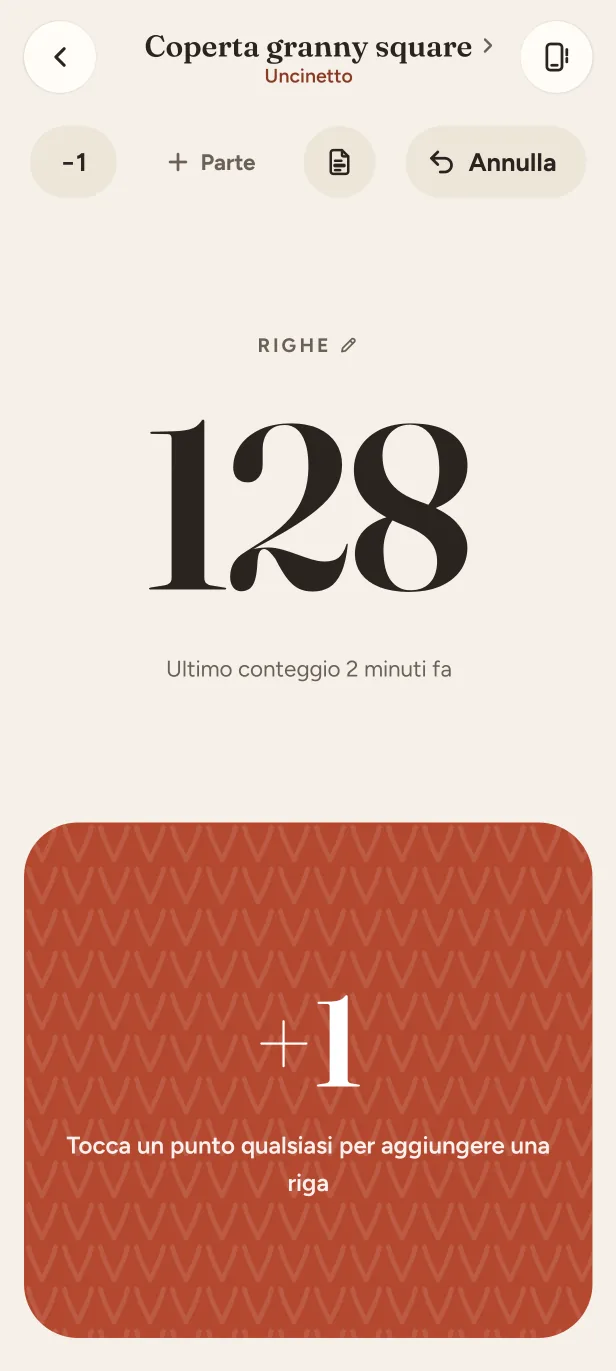 Il contatore di un progetto all'uncinetto a 128 righe, con un grande pulsante +1.